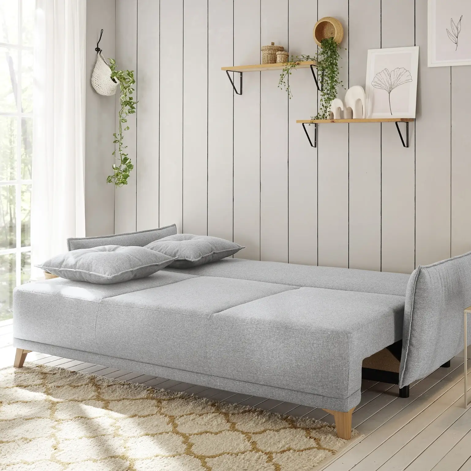 Canapé-lit gris clair PAMPLONA 3DL avec coffre de lit, 6 coussins de dossier et 2 coussins décoratifs. L/H/P env. 232/91/105 cm