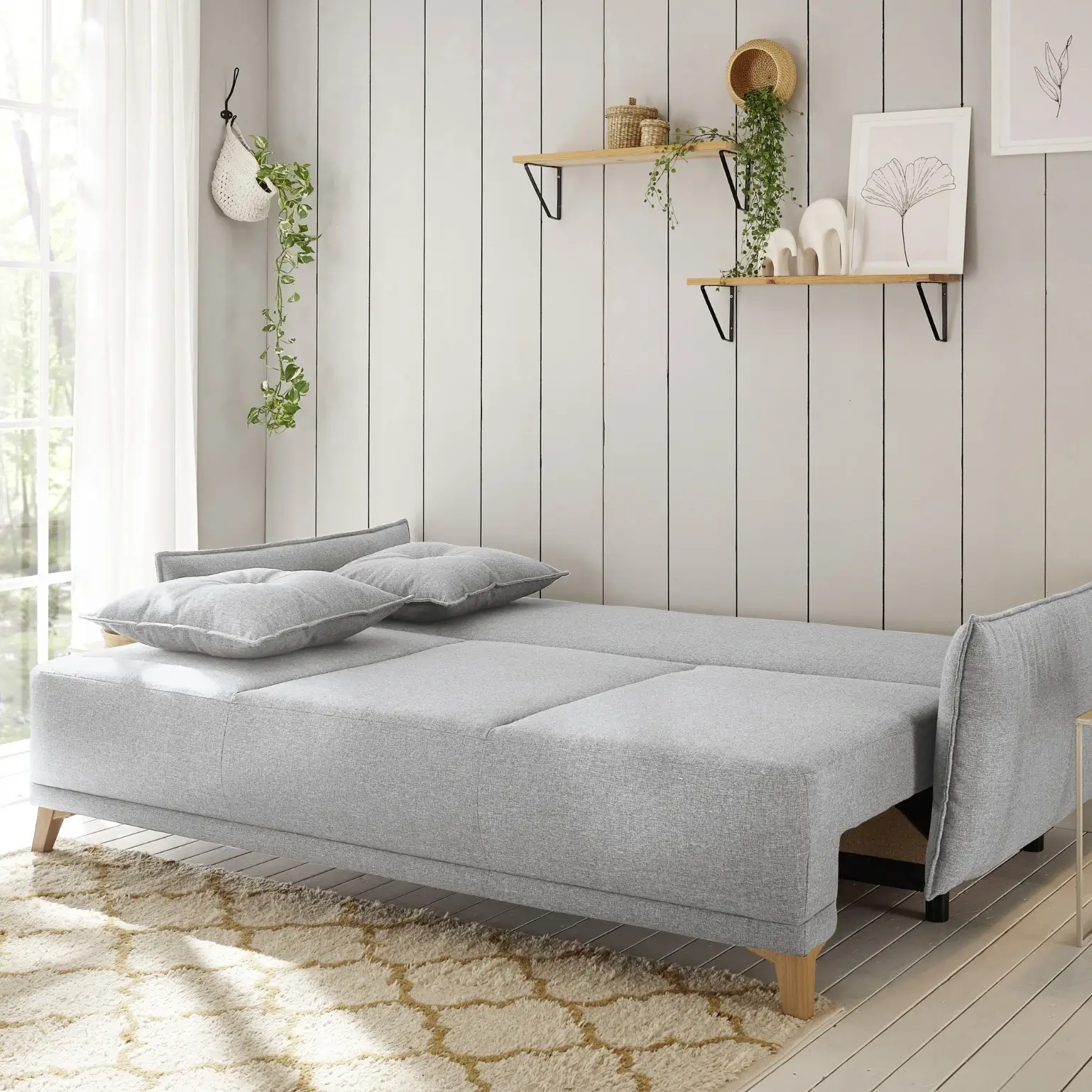 Canapé-lit PAMPLONA 3DL Canapé-lit gris clair PAMPLONA 3DL avec coffre de lit, 6 coussins de dossier et 2 coussins décoratifs. L/H/P env. 232/91/105 cm