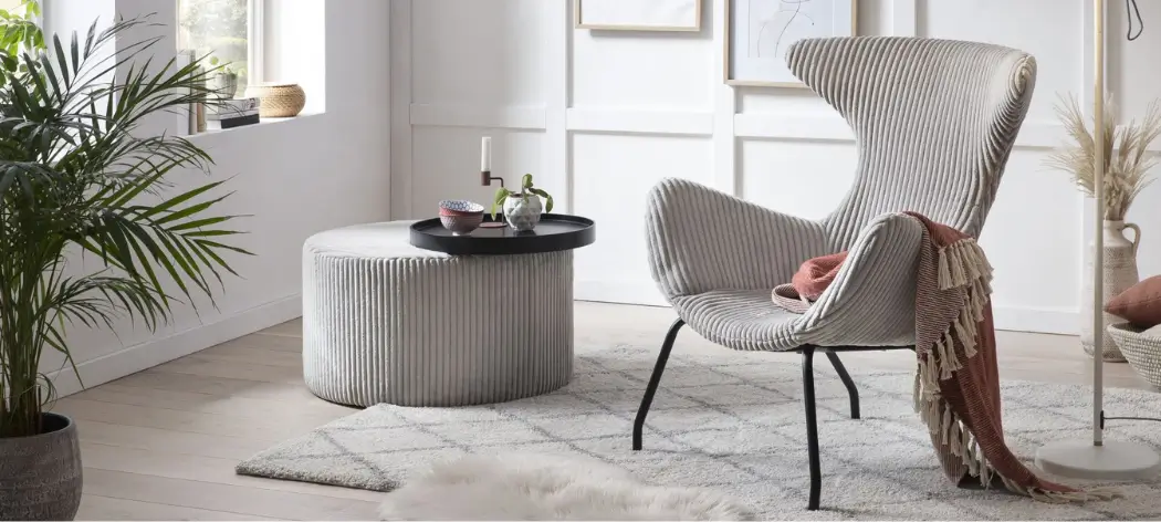 Sessel SALESFEVER Hellgrauer Sessel mit schwarzen Metallfüßen und einer abgerundeten Sitz- und Rückenfläche. Bezug: Cordstoff. B/H/T ca. 78/96/77 cm